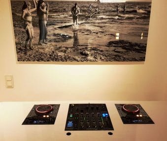 Dj desk zone with picture at the wall