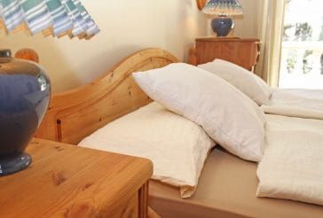 Wooden double bed and beside tables
