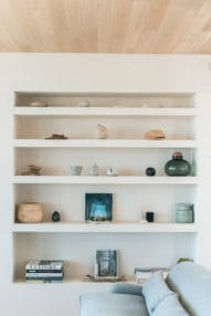 Wall shelf with decorative elements