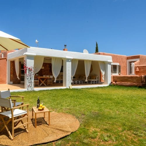 View of porch from garden with little seat group