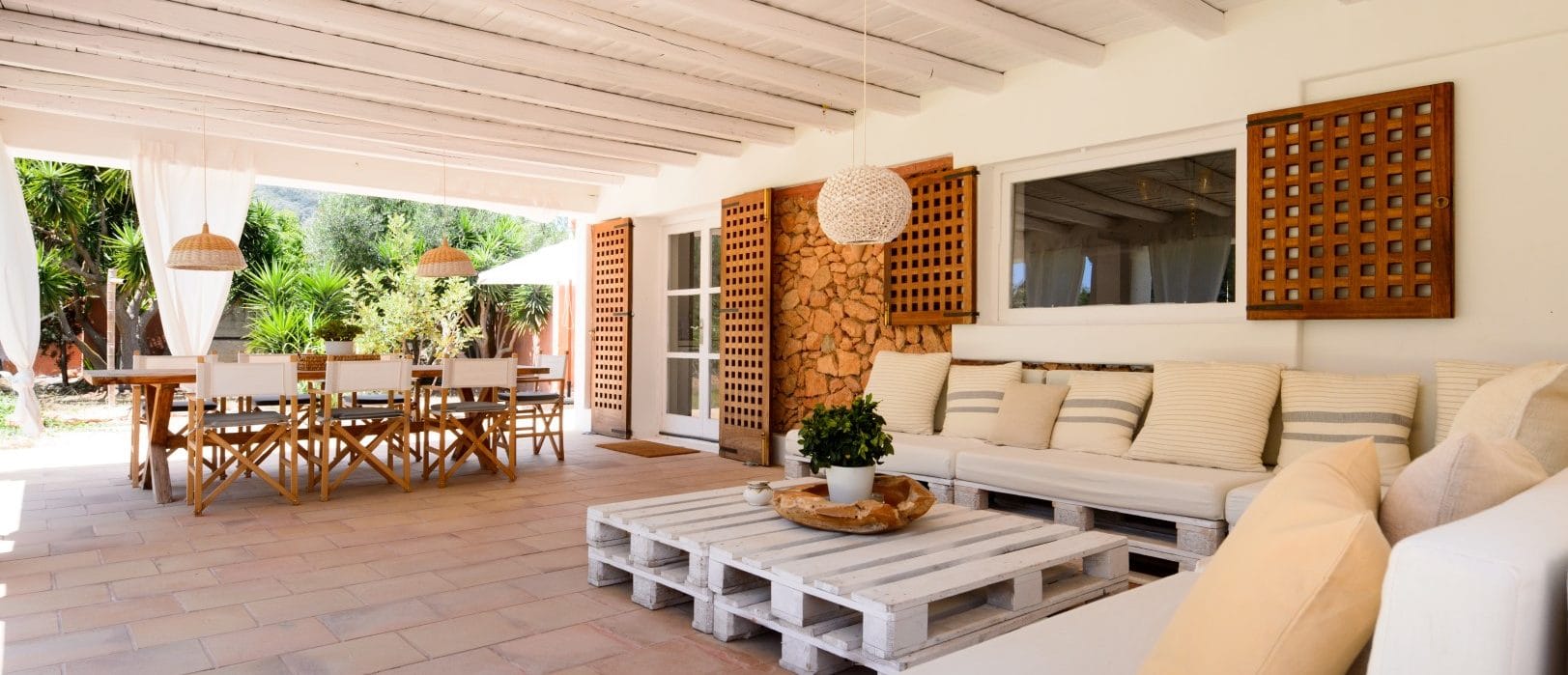 Rustic seating corner on the porch with table