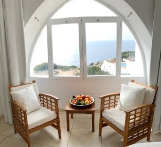 Sea view from bedroom's arched window