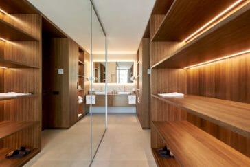 Private wooden wardrobe with bathroom sinks