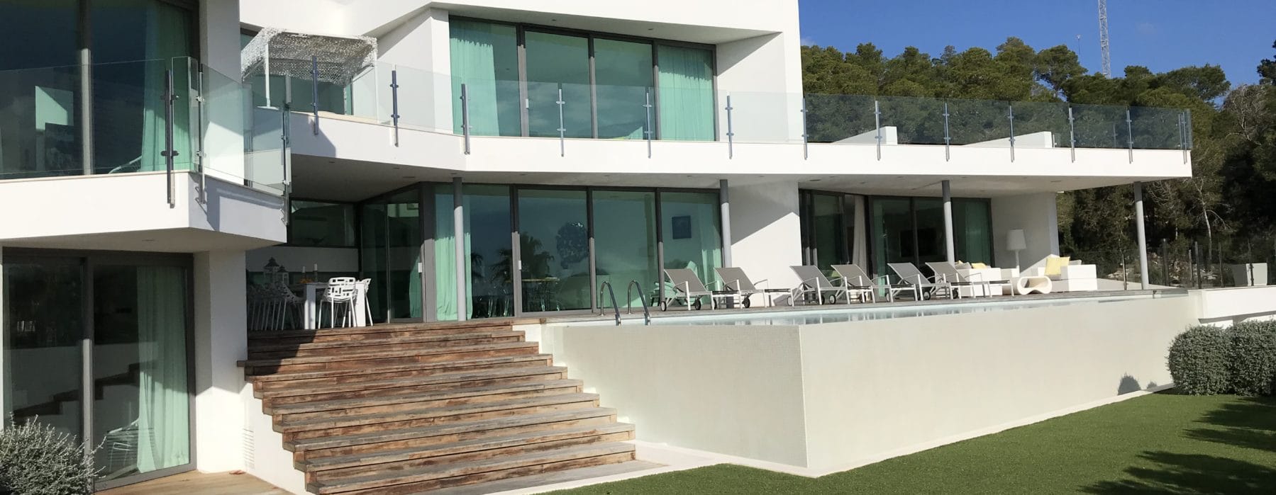 Front view of veranda and terraces with piece of garden