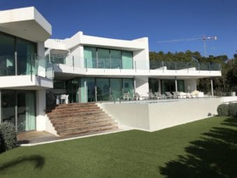 Front view of veranda and terraces with piece of garden