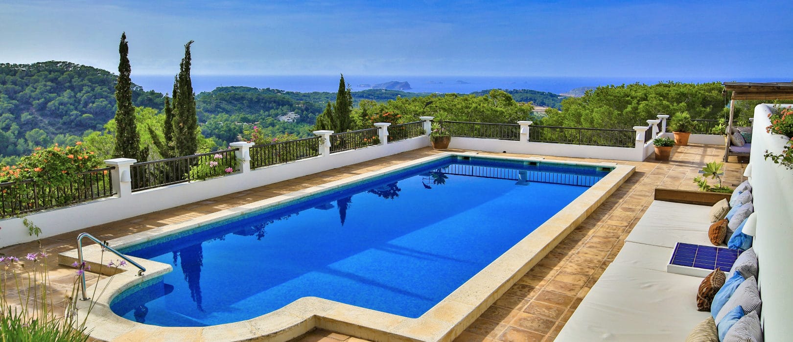 Pool on terrace with stunning view to landscape all along to the sea