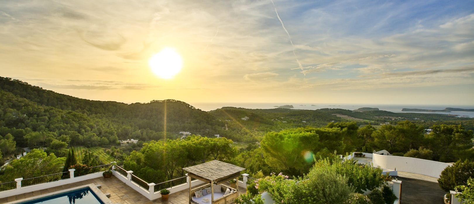 Bird's eye view onto terrace with pool with great views to landscape and sea