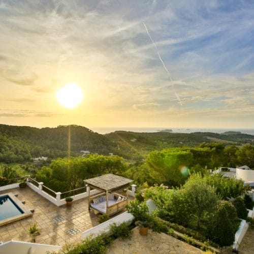Bird's eye view onto terrace with pool with great views to landscape and sea
