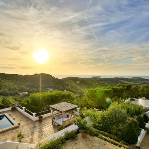 Bird's eye view onto terrace with pool with great views to landscape and sea