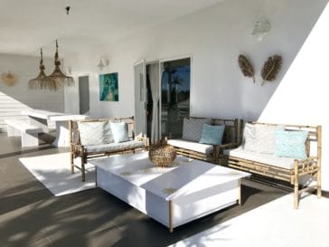Outdoor lounge zone with 2 sofas and table