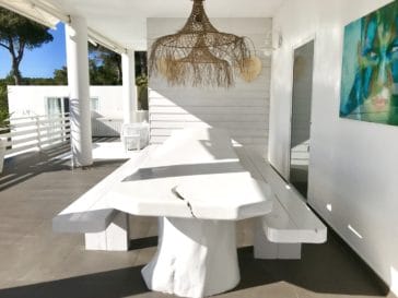White dining table on the veranda