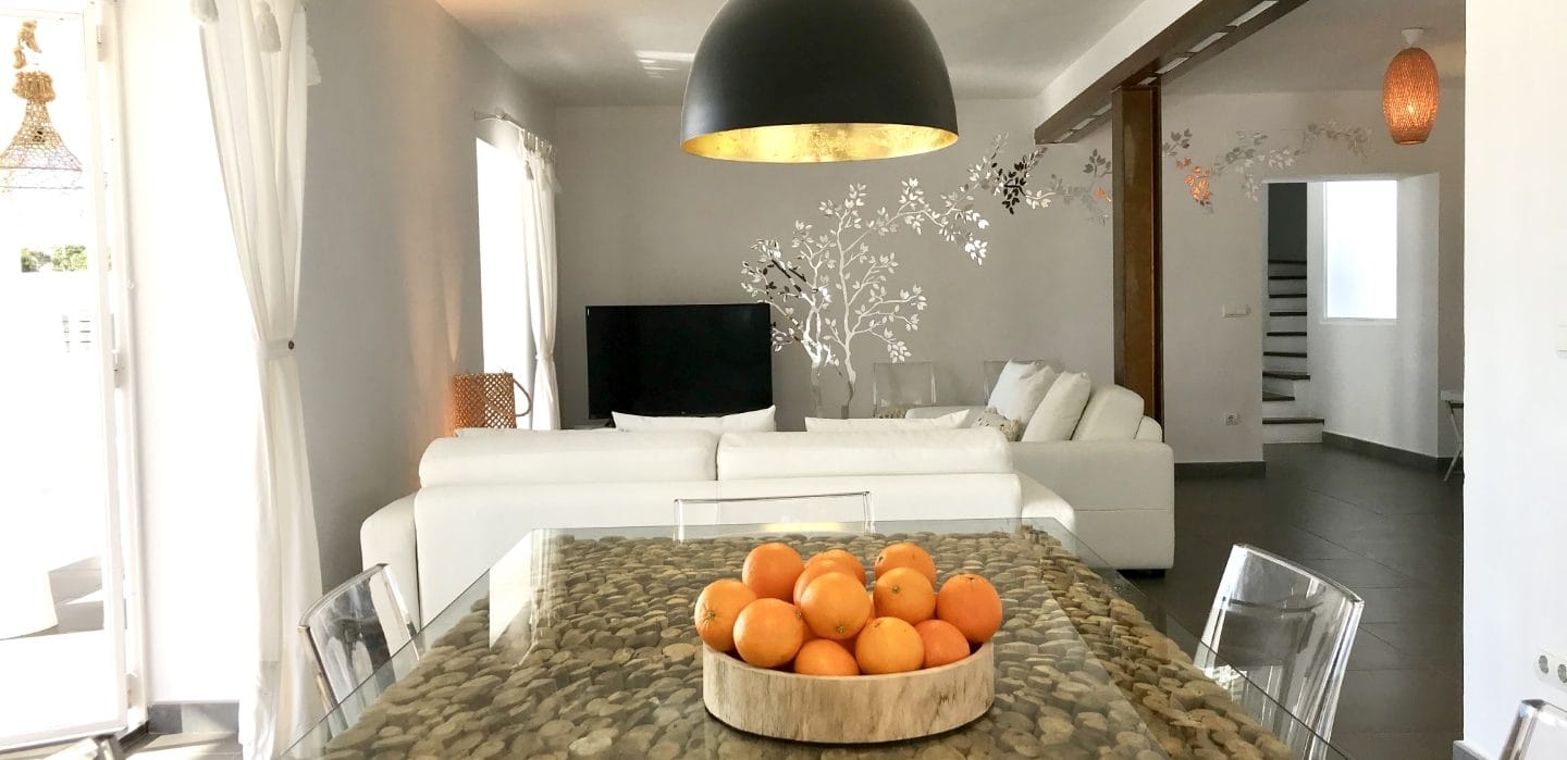 Inner dining table of living room with oranges