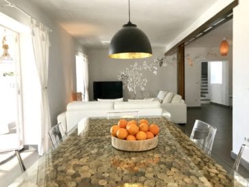 Inner dining table of living room with oranges