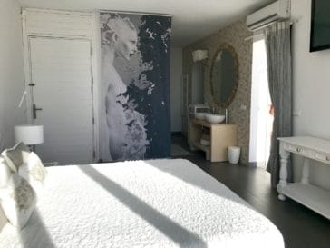 Bedroom open to sinks of en-suite bathroom