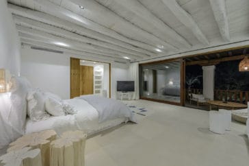 Illuminated master room with kingsize bed, en-suite bathroom and private terrace
