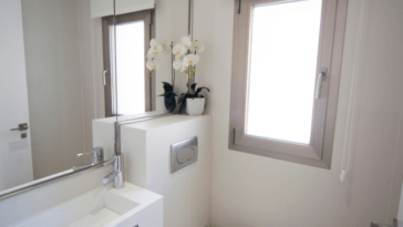 Modern Bathroom with square vanity and little window