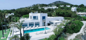 Front view of luxury villa of 2 floors in natural setting