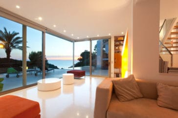 Sunset views through the glass doors of living room