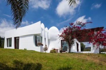 Side view of modern designed villa with mixture of round and angular outlines